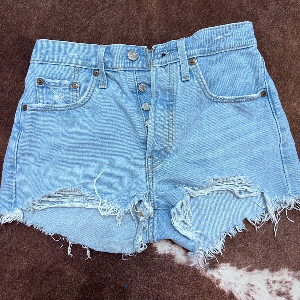 distressed blue jean shorts